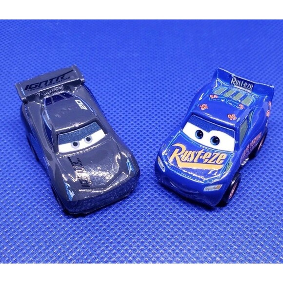 Other - Disney/Pixar/Mattel/Die-cast Mini Racers Jackson Storm & Rust-eze  Lot Of 2....